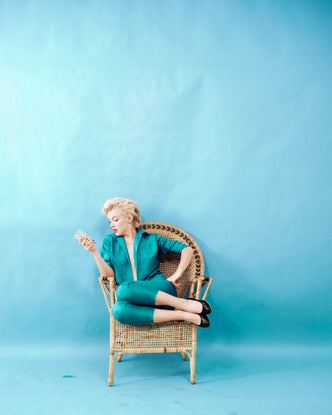 Marilyn Monroe, Wicker Sitting, 1955